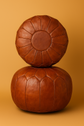 Moroccan Leather Pouf – Warm Form, Grounded Design
