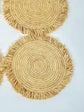 Handmade round raffia placemats with fringed edges - Natural table setting..